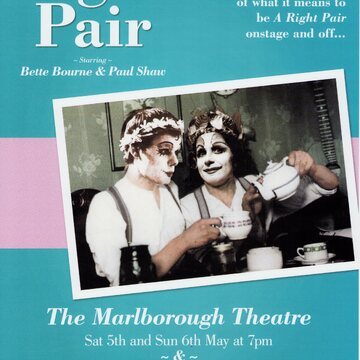 Poster with turquoise blue and pink striped background. In the centre is a sepia-toned photograph of two people in black and white drag make-up and wearing laurel headbands. Both wear white shirts and braces and are sitting at a table. The person on the right pours tea from a teapot into a teacup held by the person on the left. The poster title reads 'A Right Pair ~ Starring ~ Bette Bourne & Paul Shaw'. At top right smaller text reads 'The giddy high hell moments and occasional down at heel moments of what it means to be A Right Pair onstage and off...'. Text below the photograph reads 'The Marlborough Theatre Sat 5th and Sun 6th May at 7pm ~& ~ Sat 12th and Sun 13th May at 8pm Tickets £10/£8 available from www.brightonfringe.org or call 01273 91 72 72 for the Fringe box office'. At the bottom is a line of website and social media links for Pink Fringe, and beneath this the logos of (left to right) Pink Fringe, Brighton Fringe 2012, and The Marlborough Theatre.